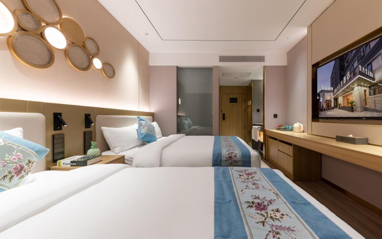 East Sacred Hotel--Very Near Beijing Tiananmen Square ,The Forbidden City,The Temple Of Heaven ,3 Minutes' Walk To Wangfujing Subway ,Located In The Center Of Beijing, Many Shopping Malls Around,Newly Renovated Hotel-Able To Receive Foreign Guests Exterior photo Deluxe Room