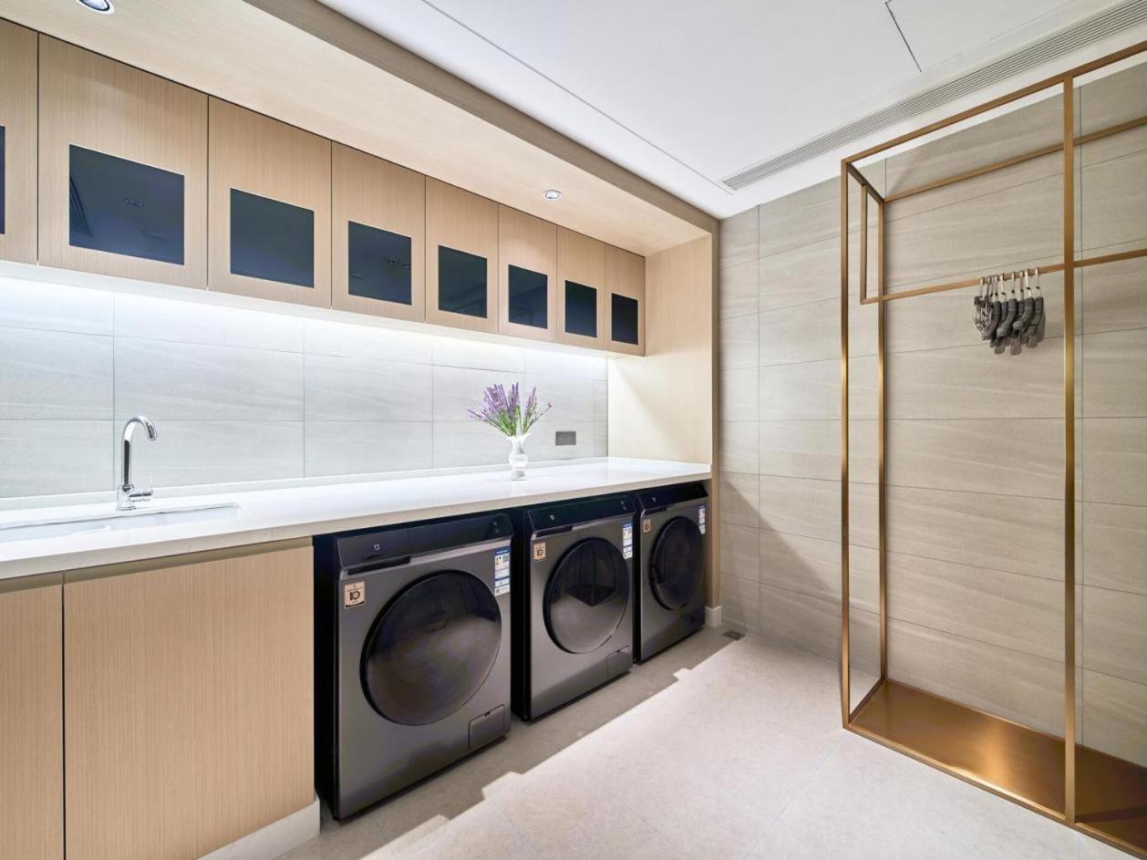 East Sacred Hotel--Very Near Beijing Tiananmen Square ,The Forbidden City,The Temple Of Heaven ,3 Minutes' Walk To Wangfujing Subway ,Located In The Center Of Beijing, Many Shopping Malls Around,Newly Renovated Hotel-Able To Receive Foreign Guests Exterior photo Laundry room